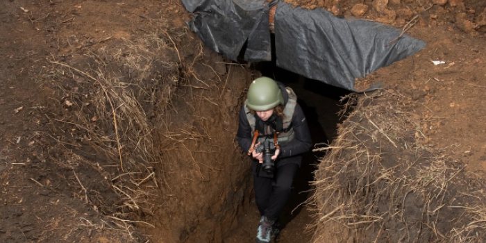 Olha Kovalyova working in Donetsk oblast in June 2024. Photo by Heorhiy Ivanchenko